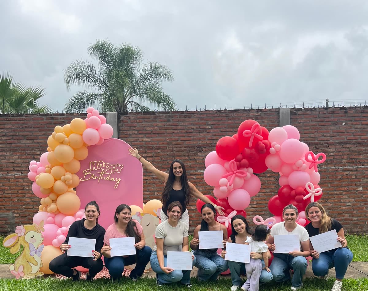 Workshop graduates with their diplomas